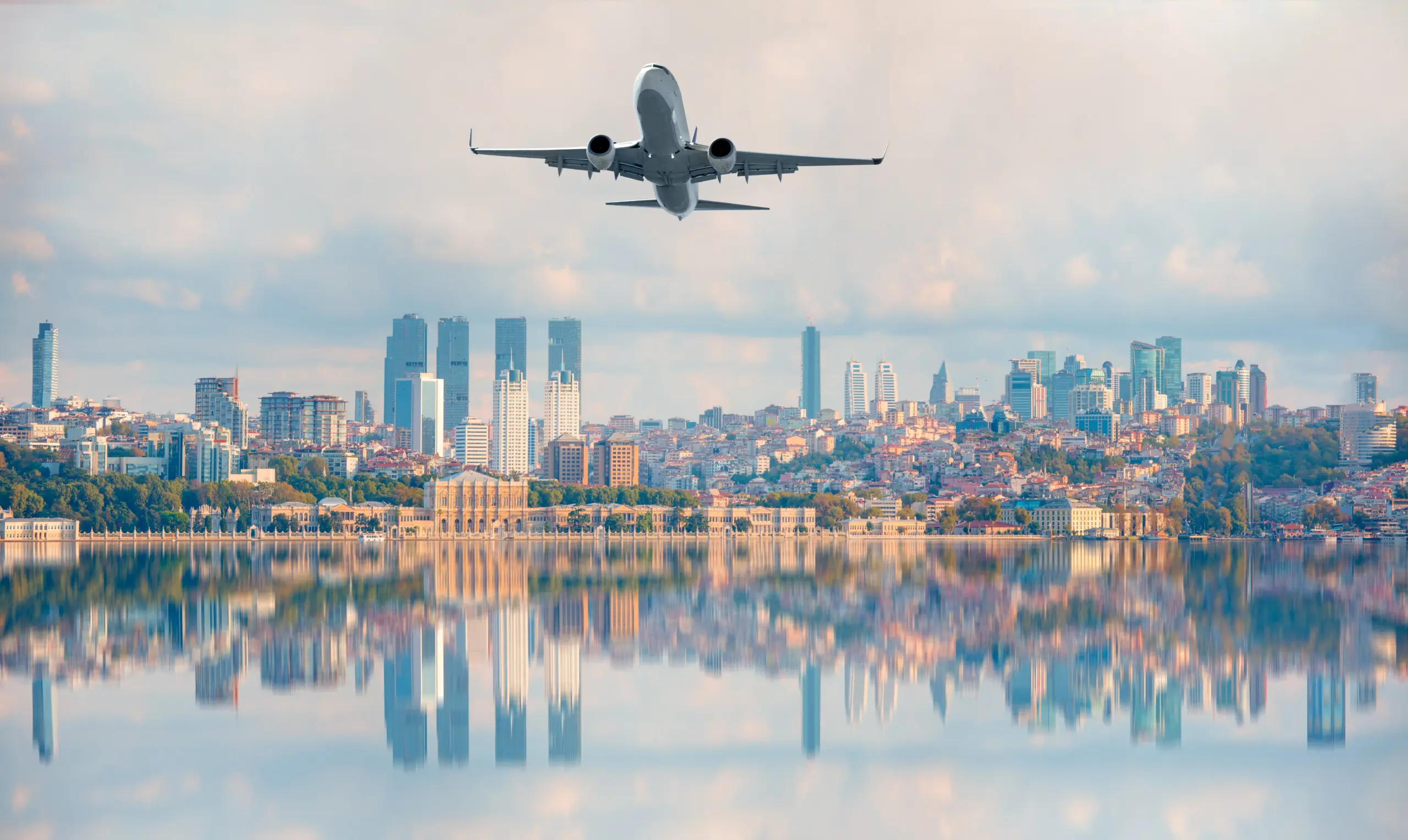 Plane flying over city